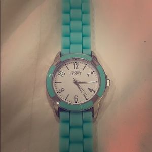 Bright, flexible aqua green watch
